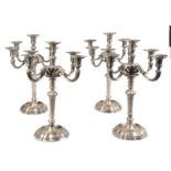 Set of four four-armed candlesticks in silver 800. Whit marks. Missiaglia. Italy. Venice. 20th centu