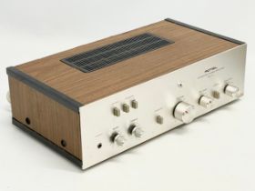 A vintage Rotel Integrated Stereo Amplifier. Model RA-214.