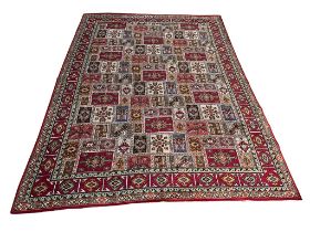 A large vintage Middle Eastern hand knotted rug. 271x364cm