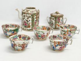 A 7 piece mid/late 19th century Chinese Canton Famille Rose tea service. Teapot, 2 handled sugar
