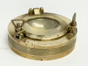 A vintage ships porthole ashtray. 11cm