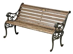 A vintage garden bench with cast iron ends. 126cm