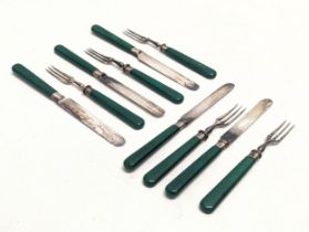 A set of silver mounted cutlery. Forks measure 15cm