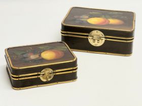 A pair of early 20th century hand painted, brass bound lacquered boxes. 18x15x7cm