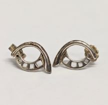 A pair of silver earrings