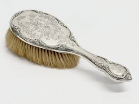 A silver hair brush. Birmingham, 1907. 25cm