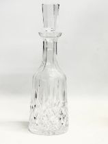 A tall Waterford Crystal ‘Lismore’ decanter and stopper. 33cm