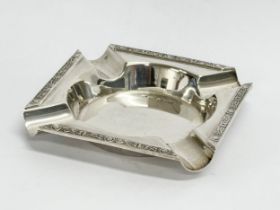 An ornate silver ashtray. Sheffield, 1931. 96 grams. 9x9cm