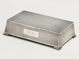 A large silver cigarette case. Birmingham, 1946. Wooden interior. 18x11x5cm