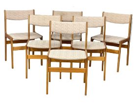 A set of 6 Danish Mid Century teak dining chairs designed by Erik Buch.
