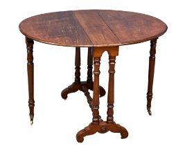 A Victorian mahogany Sutherland table on brass cup casters. Open 104x80x74cm. Closed 21.5x80x74cm