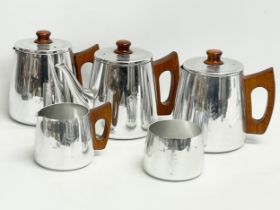 A Mid Century stainless and teak tea service.