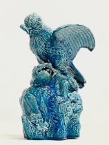 A late 19th century Chinese Guangxu turquoise glazed bird of prey. 1875-1908. 15x19x27cm