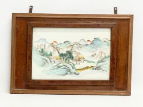 A 19th century Chinese hand painted porcelain panel in original frame. 40.5x27cm