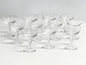 A set of 11 vintage French Art Deco style crystal champagne coupe glasses. 9x11.5cm