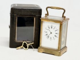 A good quality late 19th century Kands brass carriage clock with case and key. Clock measures 9.