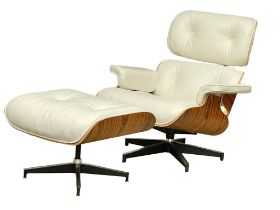 A good quality Charles & Ray Eames style rosewood and leather swivel chair with ottoman.