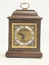 An Elliot London brass face mantle clock by Garrard & Co. 15.5x8.5x23cm