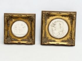2 ornate gilt framed wall plaques. 31x31cm