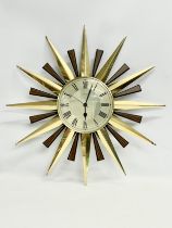 A Mid Century ‘Sunburst’ wall clock. Metamec. 60cm