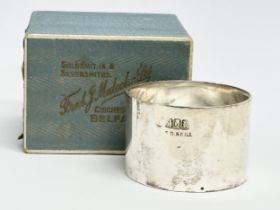 An Irish silver napkin ring with box. Dublin, 1912. 39.2 grams. Stamped S.D. Neill.