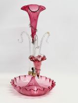 A large Victorian Cranberry Glass epergne. 27x51cm