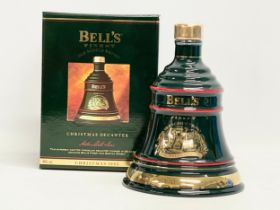 An unopened bottle of Bell’s Finest Old Scotch Whisky with box. Christmas 1993. The Old Man’s Art.