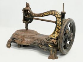 A late 19th century sewing machine. 34cm