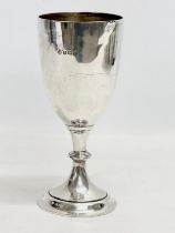 A tall early 20th century silver cup. Birmingham. 182 grams. 19cm