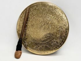 A late 19th century Egyptian Revival brass gong. 27cm