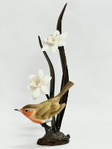 A Royal Worcester porcelain and bronzed “American Robin” 16cm