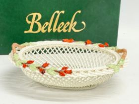 A Belleek Pottery ‘Fuchia Basket’ with box. 20x16x7cm