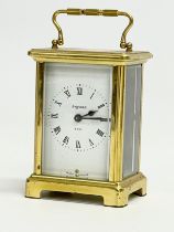 A vintage French brass carriage clock by Duverdrey & Bloquel.