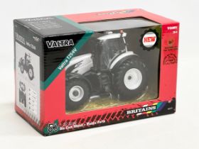 An unused Britains Valtra TZ54V tractor in box. Die-Cast Model and Plastic Parts. 22x12.5x15cm