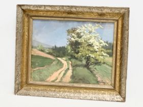 A signed continental oil painting on board and a gilt frame. 48x37cm. Frame 65x53cm