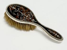 A silver and faux tortoise shell hair brush. London, 1916. 25cm