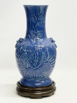 A large Chinese Emperor Jiaqing (1760–1820) blue glazed pot. 19x36.5cm