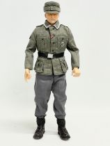 A Dragon Models LTD WW2 German SS Officer 1/6 scale action figure. 33cm
