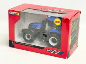 An unused Britains “New Holland” T8.435 Tractor in box. 1:32 scale. 25x13x15.5cm