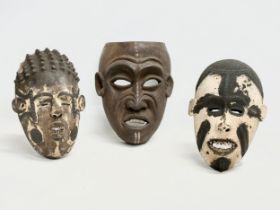 3 early 20th century African face masks. 28cm