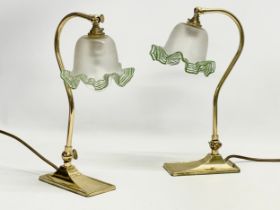 A pair of good quality Christopher Wray brass swan neck adjustable table lamps with frilled glass