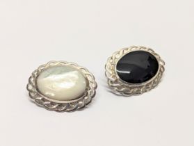 2 silver brooches