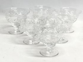 4 sets of crystal coupe glasses.