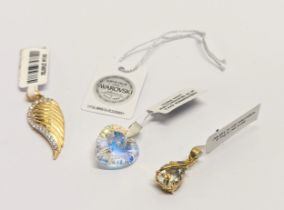 3 silver pendants including a Swarovski crystal pendant.