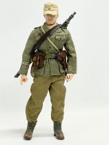 A Dragon Models LTD WW2 German 1/6 scale action figure. Africa 31.5cm