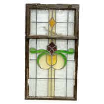 A vintage stained glass panel. 51x92cm