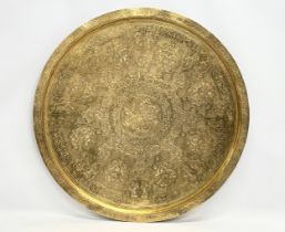 A large early 20th century Indian brass tray. 70cm