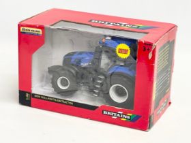 An unused Britains “New Holland” T8.435 Tractor in box. 1:32 scale. 25x13x15.5cm