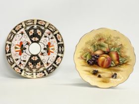 A Royal Crown Derby 2451 Imari cabinet plate and an Aynsley “Orchard Gold” cabinet plate. 22.5cm