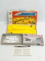 A vintage Dragster game and a Revell A-7A Corsair II model in box.